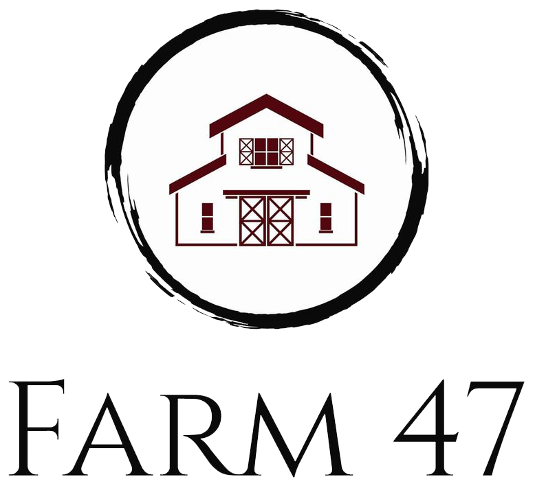 Logo of Farm 47 featuring a stylized barn design within a circular outline, emphasizing agricultural themes and rustic charm. The text "FARM 47" is prominently displayed below the barn illustration.